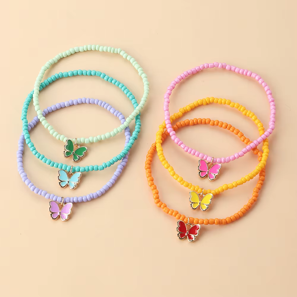 Ensemble de 6 bracelets papillons empilables – Perles colorées et breloques métalliques pour un styl