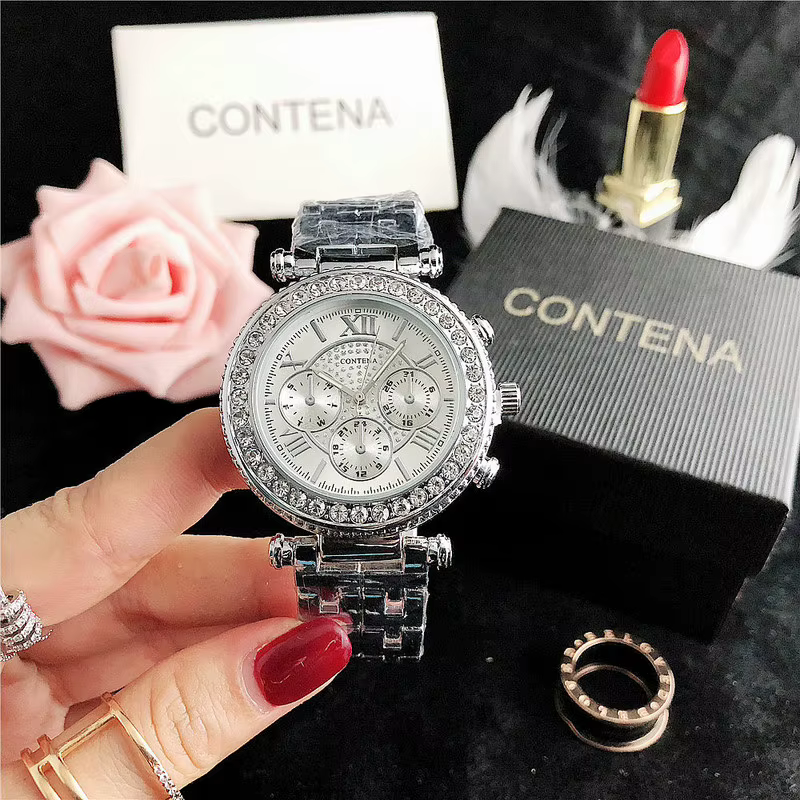 Montre à quartz en acier inoxydable avec biscuits pour femme