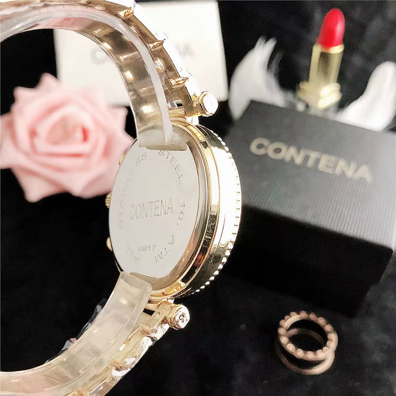 Montre à quartz en acier inoxydable avec biscuits pour femme
