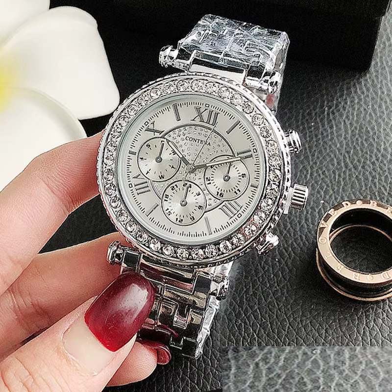 Montre à quartz en acier inoxydable avec biscuits pour femme