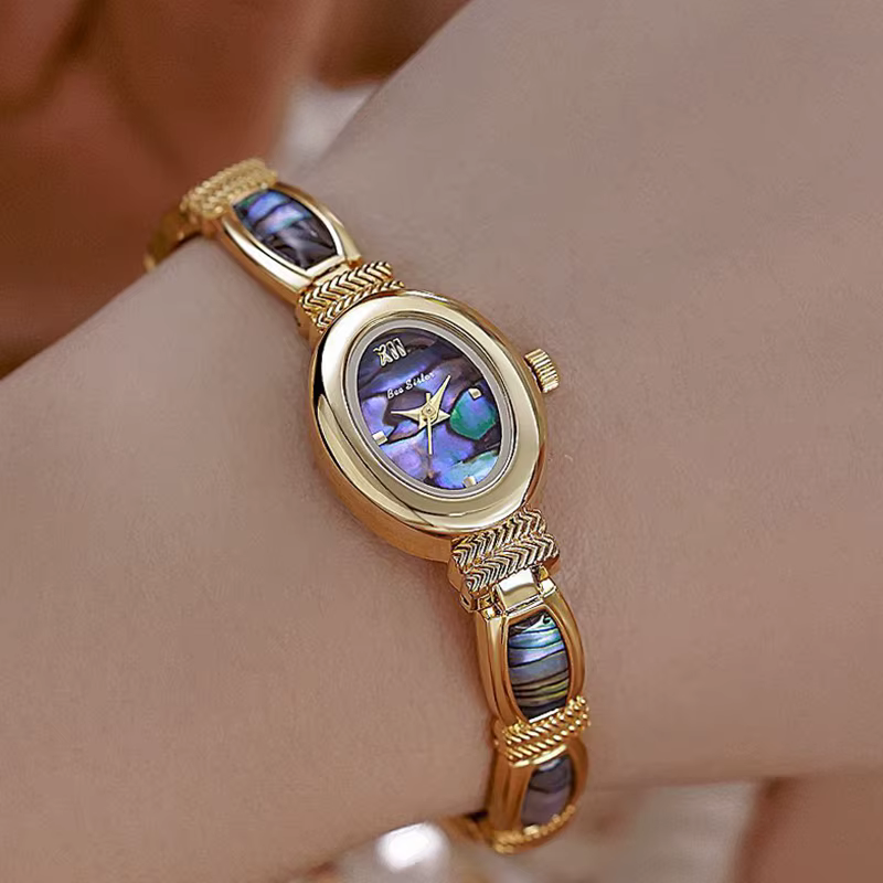 Cadran ovale femmes Bracelet montres haut de gamme de luxe dames