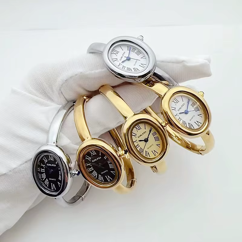 Marque de luxe femmes Rome cadran Montre à Quartz mode or couleurs bracelet montre-bracelet Relogio Feminino livraison