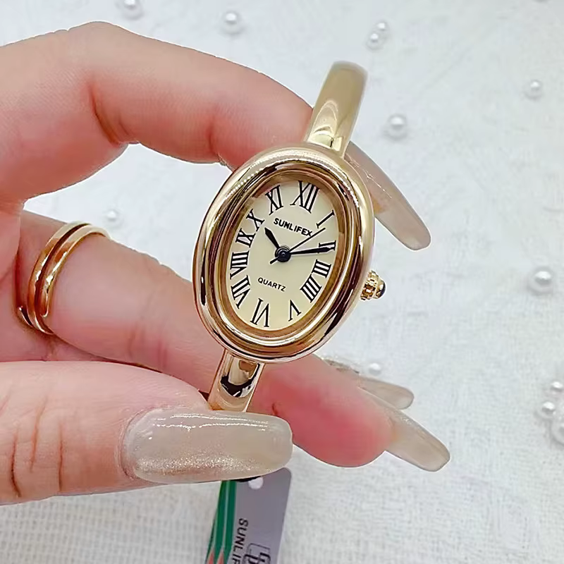 Marque de luxe femmes Rome cadran Montre à Quartz mode or couleurs bracelet montre-bracelet Relogio Feminino livraison