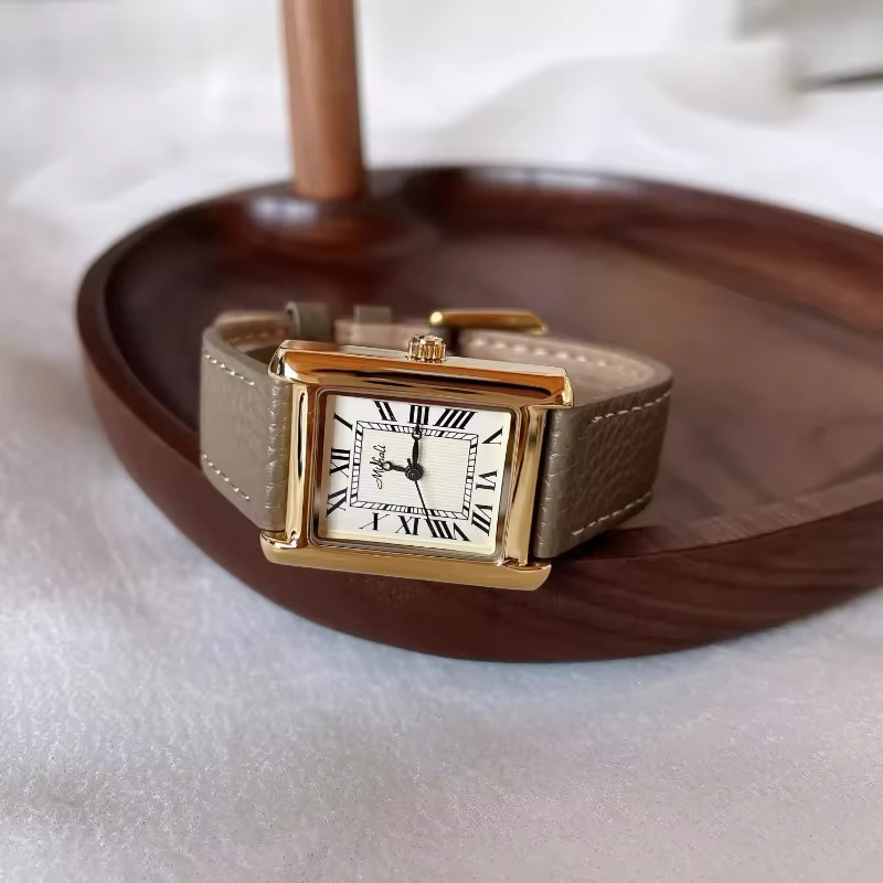 Montre pour femme de luxe Quartz Vintage plaqué or numéro romain H cadran bracelet en cuir