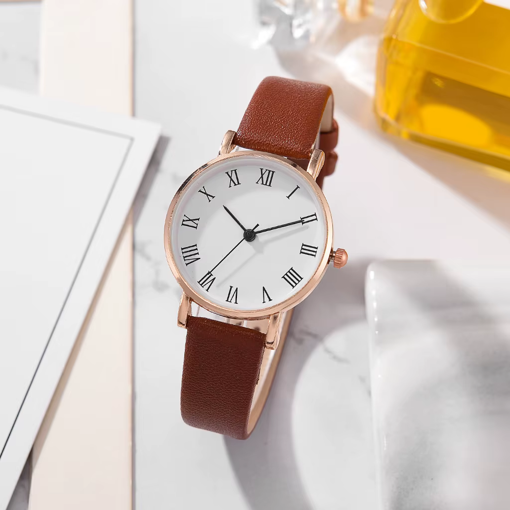 Montre à quartz analogique brillante en cuir PU pour femme