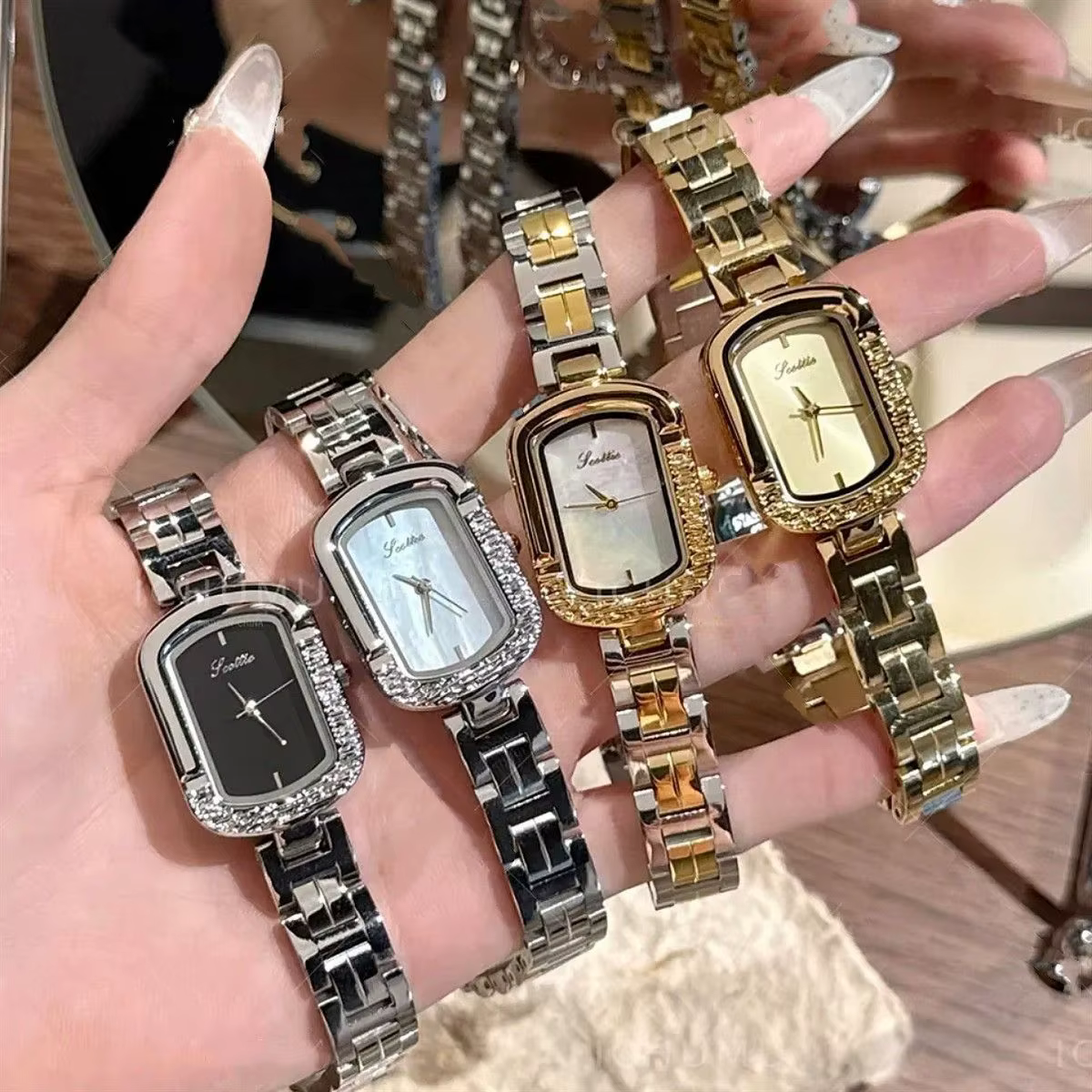 Montre carrée haut de gamme pour femmes, nouveau luxe, cadre asymétrique inhabituel, montre à Quartz en acier inoxydable doré, cadeau pour femmes, 2026