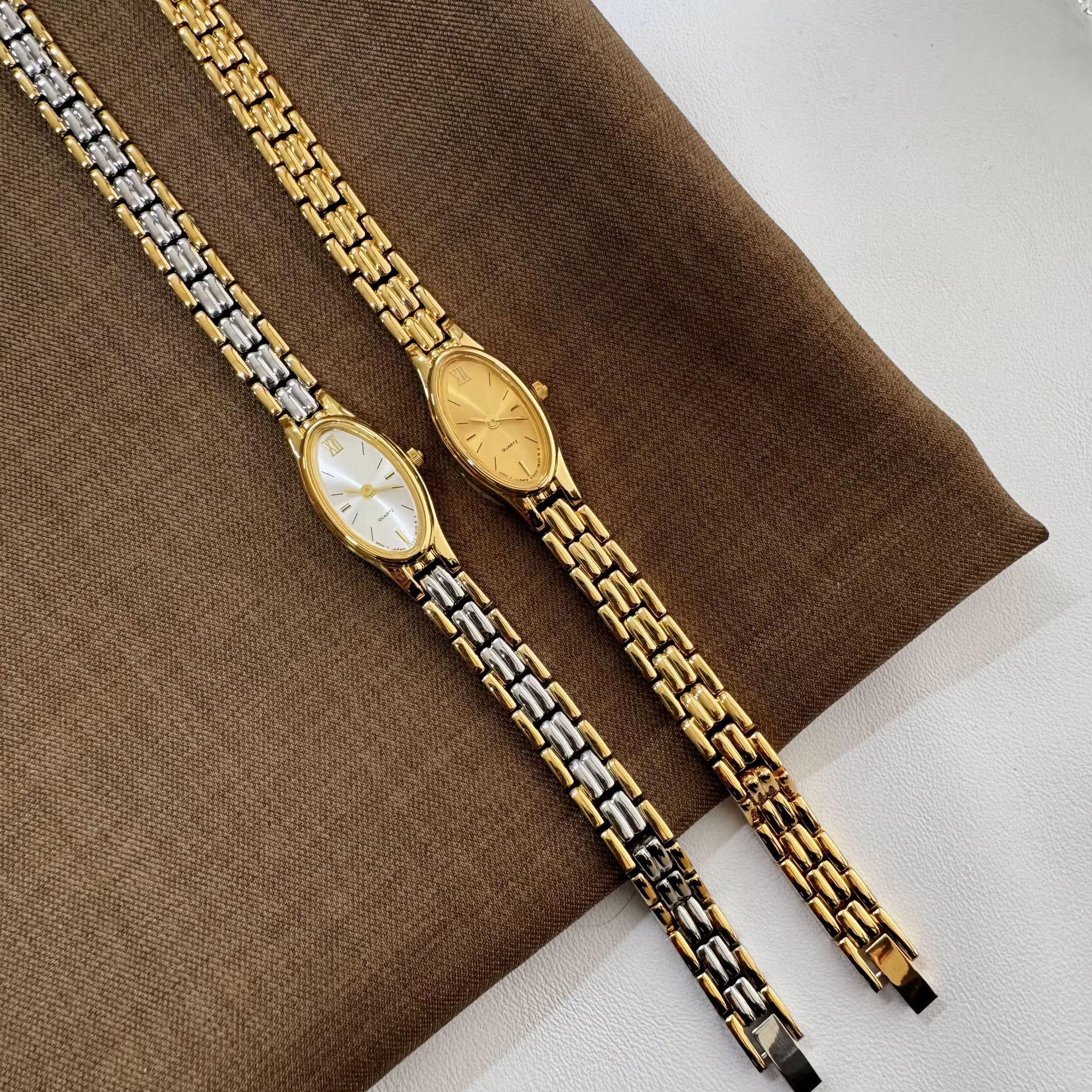 2025 nouveau style vintage étanche artistique quartz lumière luxe montre pour femme en acier