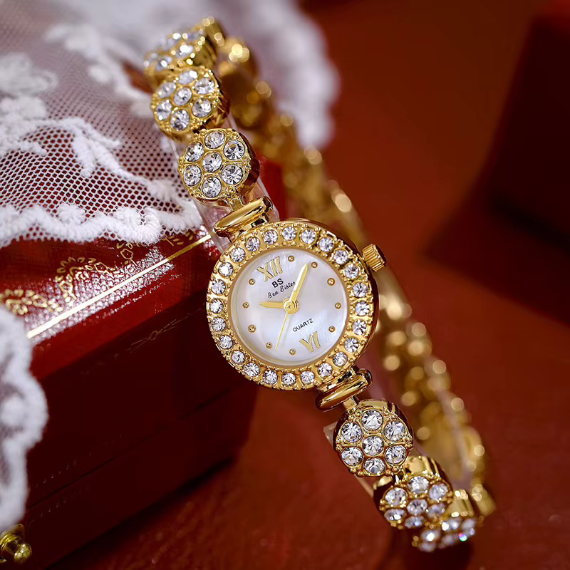 Montres-bracelets de luxe pour femmes, marque supérieure, quartz doré, or, biscuits uniques, bracelet en acier, cadeau pour dames, 2025