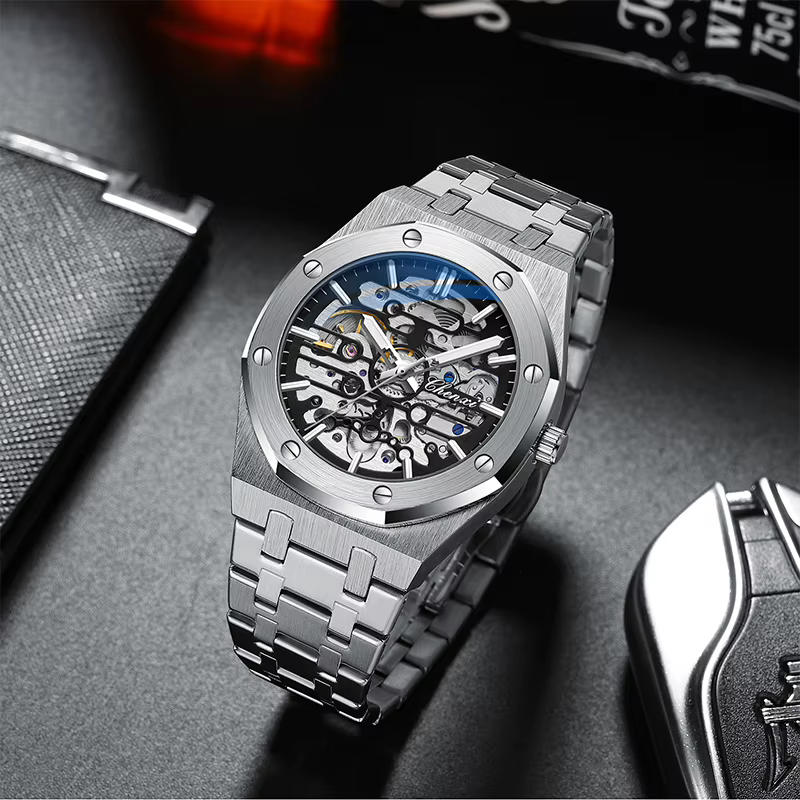 CHENXI haut de gamme évider entièrement automatique montres mécaniques pour hommes argent noir bracelet en acier inoxydable montre pour homme 2025