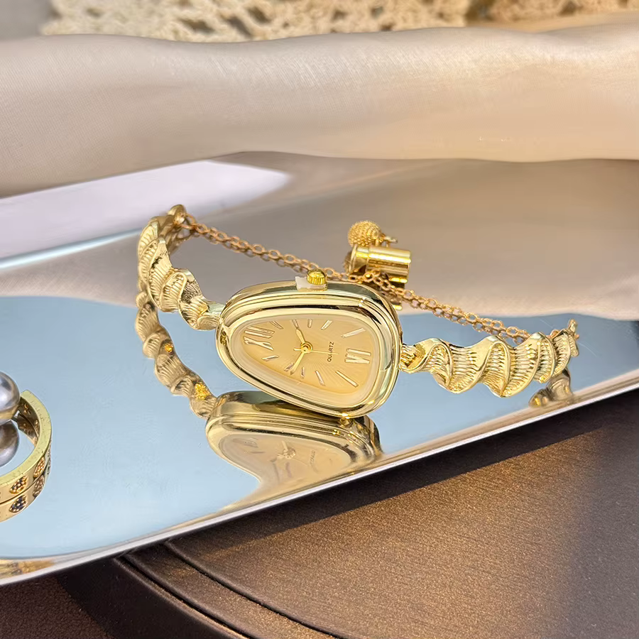 Montre à Quartz élégante en forme de serpent pour femmes