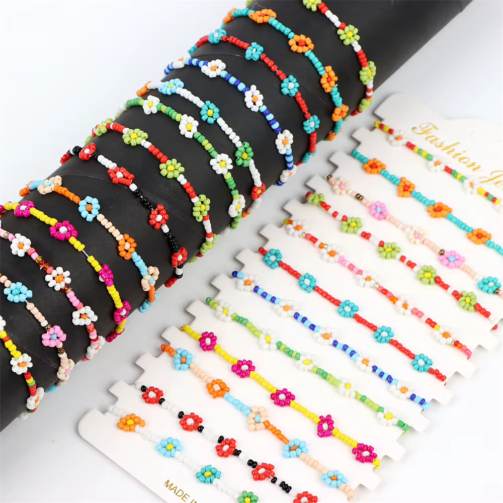 Bracelet en perles de fleur de marguerite pour femmes, 12 pièces/lot, mélange de couleurs, élastique, extensible, fait à la main, bijoux