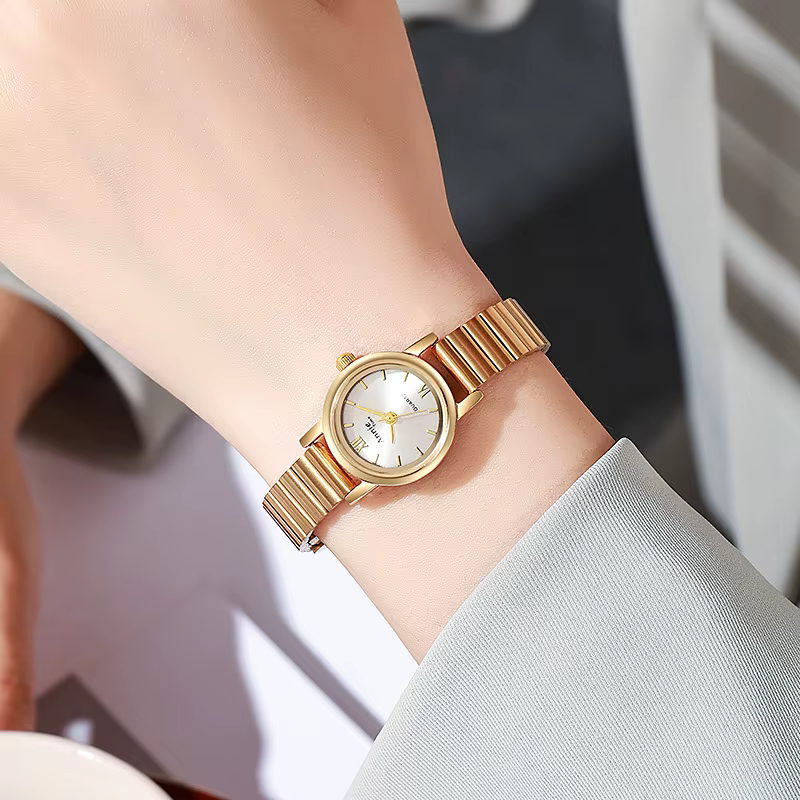 Nouvelle montre en or mode Simple cadran rond montres à Quartz pour femmes dames cadeau de luxe réglable bracelet en acier inoxydable montre-bracelet