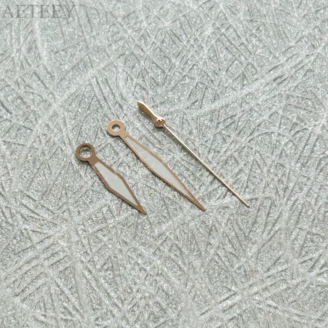 Aiguilles de montre or rose
