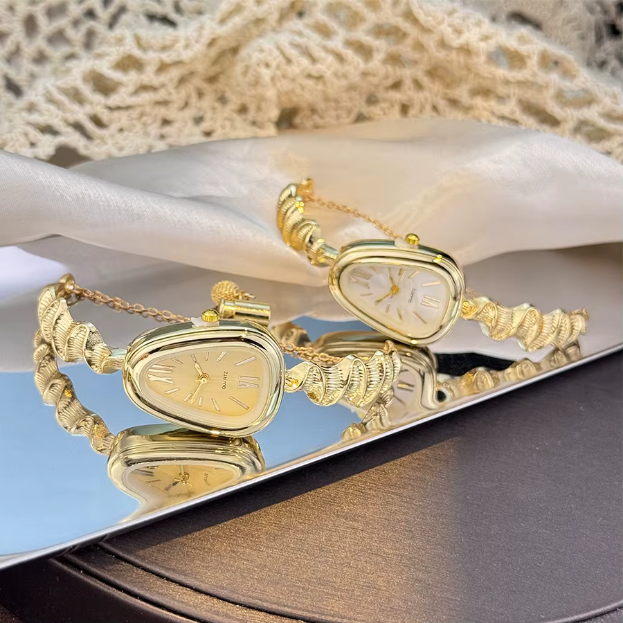 Montre à Quartz élégante en forme de serpent pour femmes