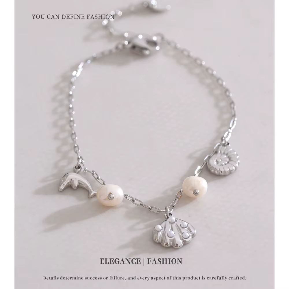 NiNice Bracelets en acier inoxydable bijoux femme perles naturelles coquilles poisson océan brise plage été mode cadeaux à la mode nouveau