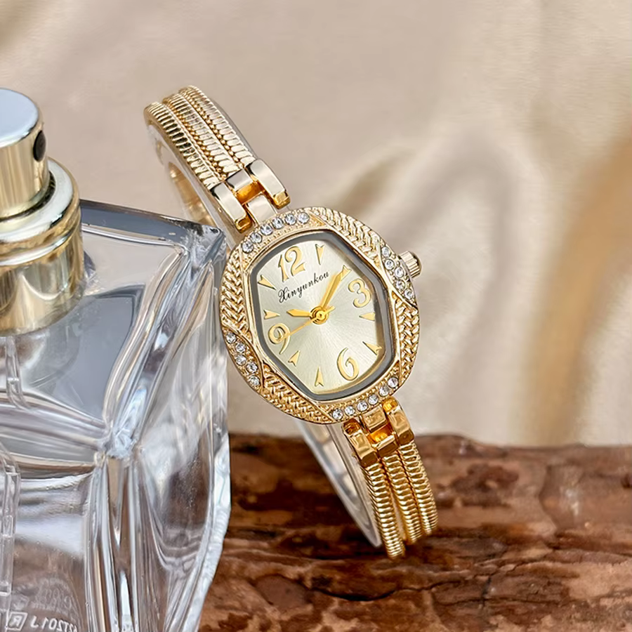 Petite montre élégante pour femme - Cadran hexagonal, design à pompon, montre vintage dorée